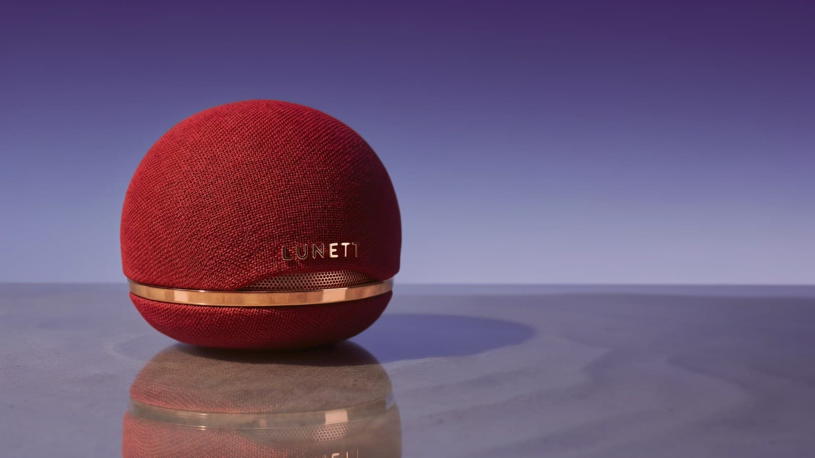 The same portable speaker recoloured red after an Ideogram 4.5 edit.